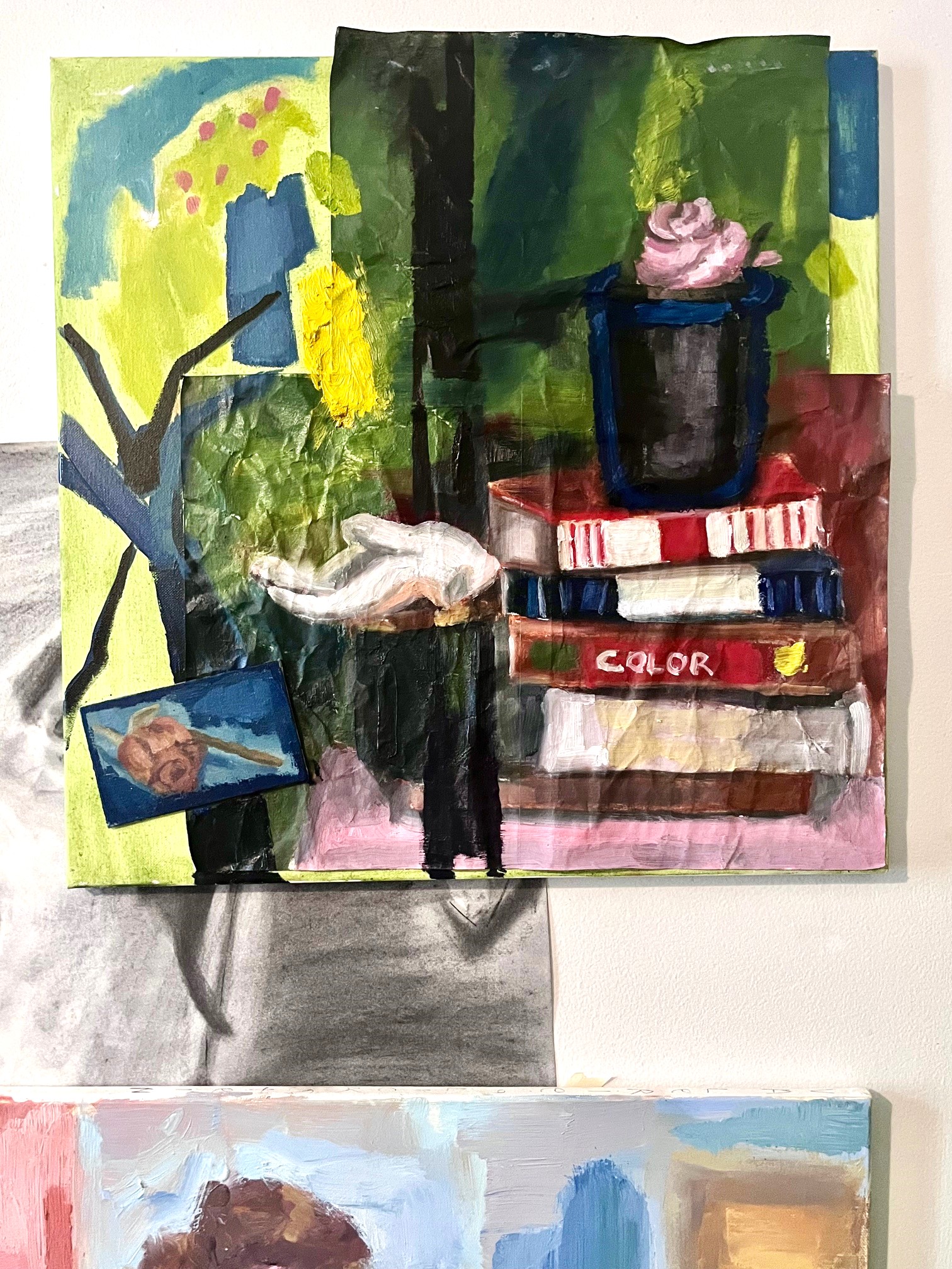 Colorblock abstracted windowsill painting of a stack of books and trinkets etc